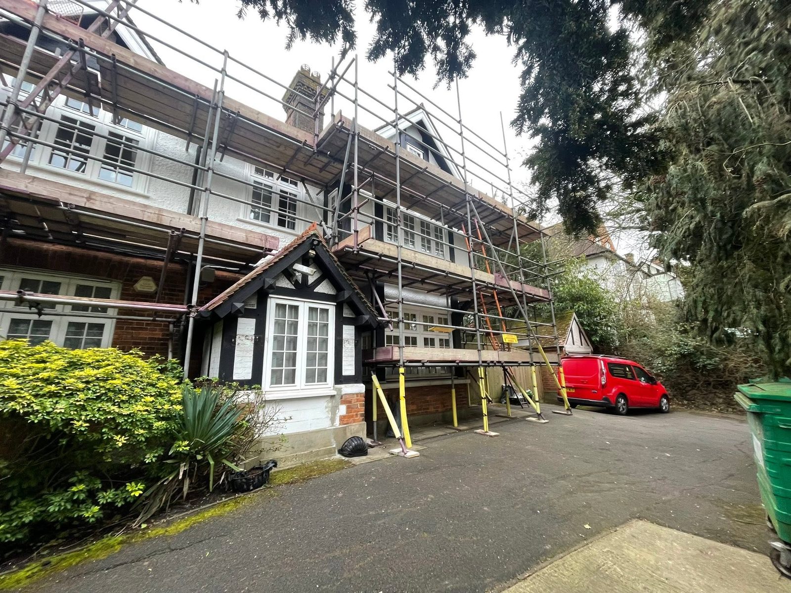 APP Decorating van and scaffold on an exterior decorating job